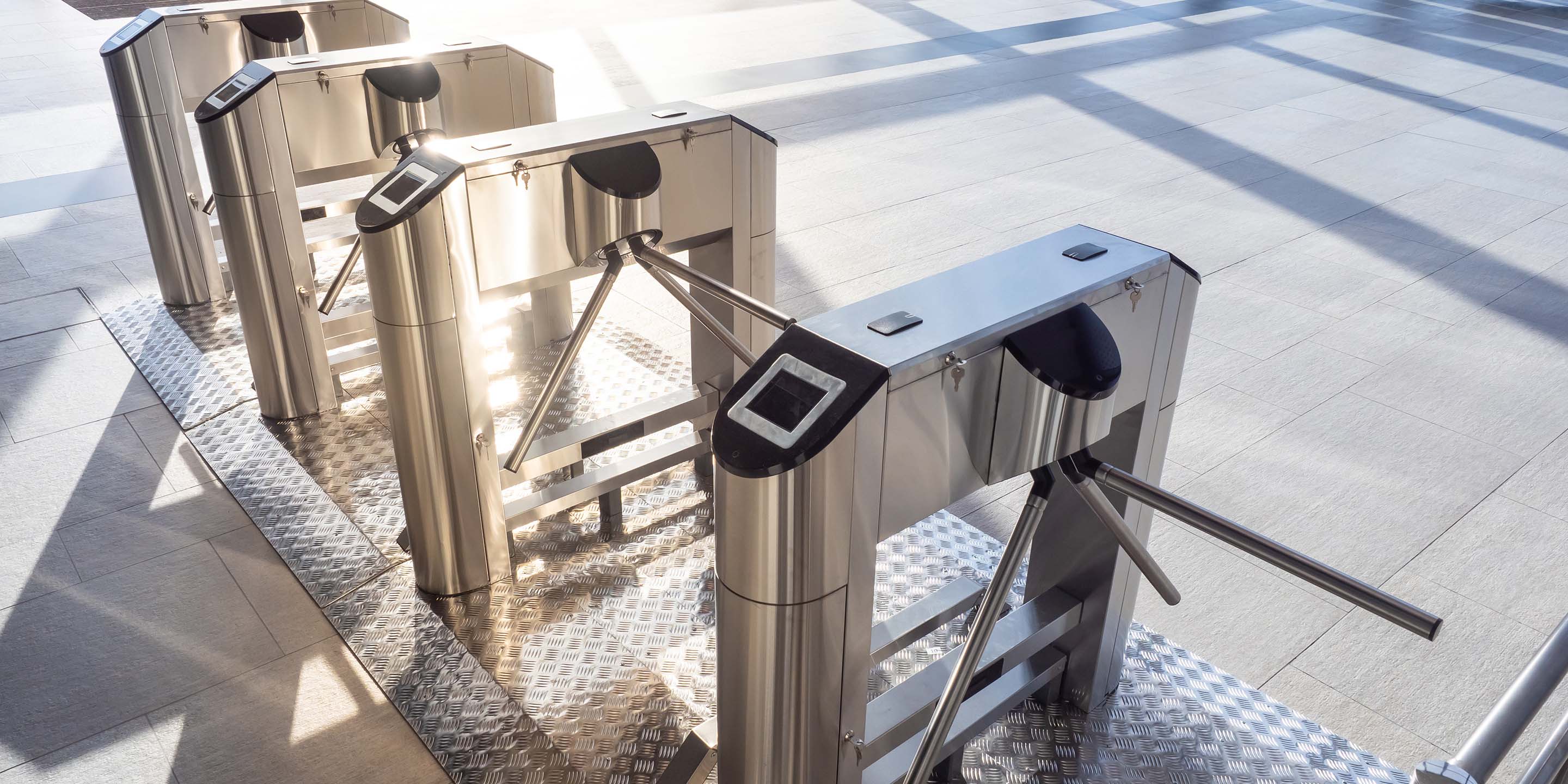 Electronic turnstile. Access system to the building. Pass through the passes. Security systems for rooms. Several turnstiles are installed nearby. Check Point. Automatic checkpoint. Building security.