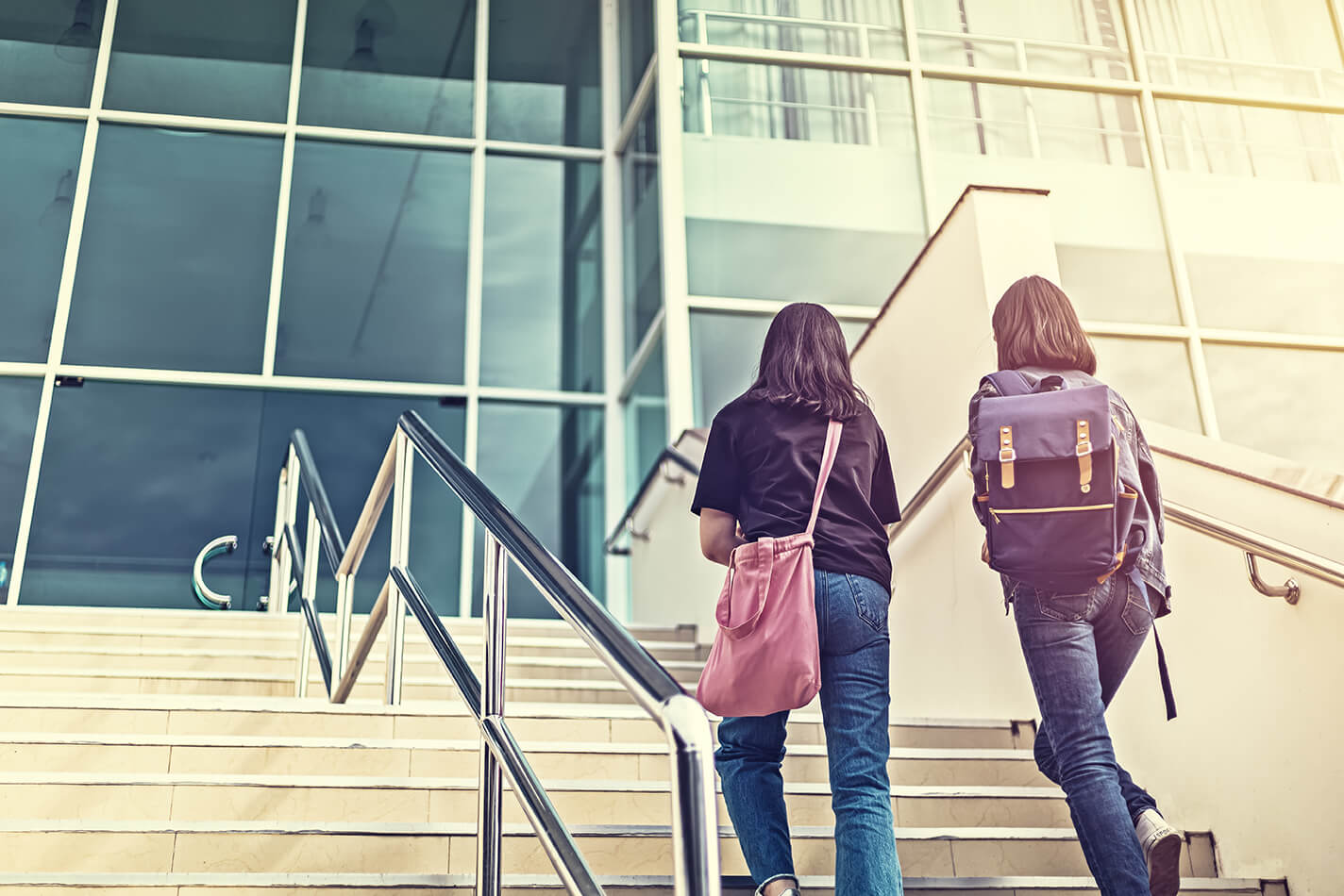 Students walking up steps