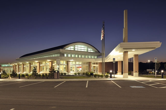 Image of a building with multiple lights on at night