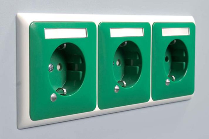 Row of sockets in wall