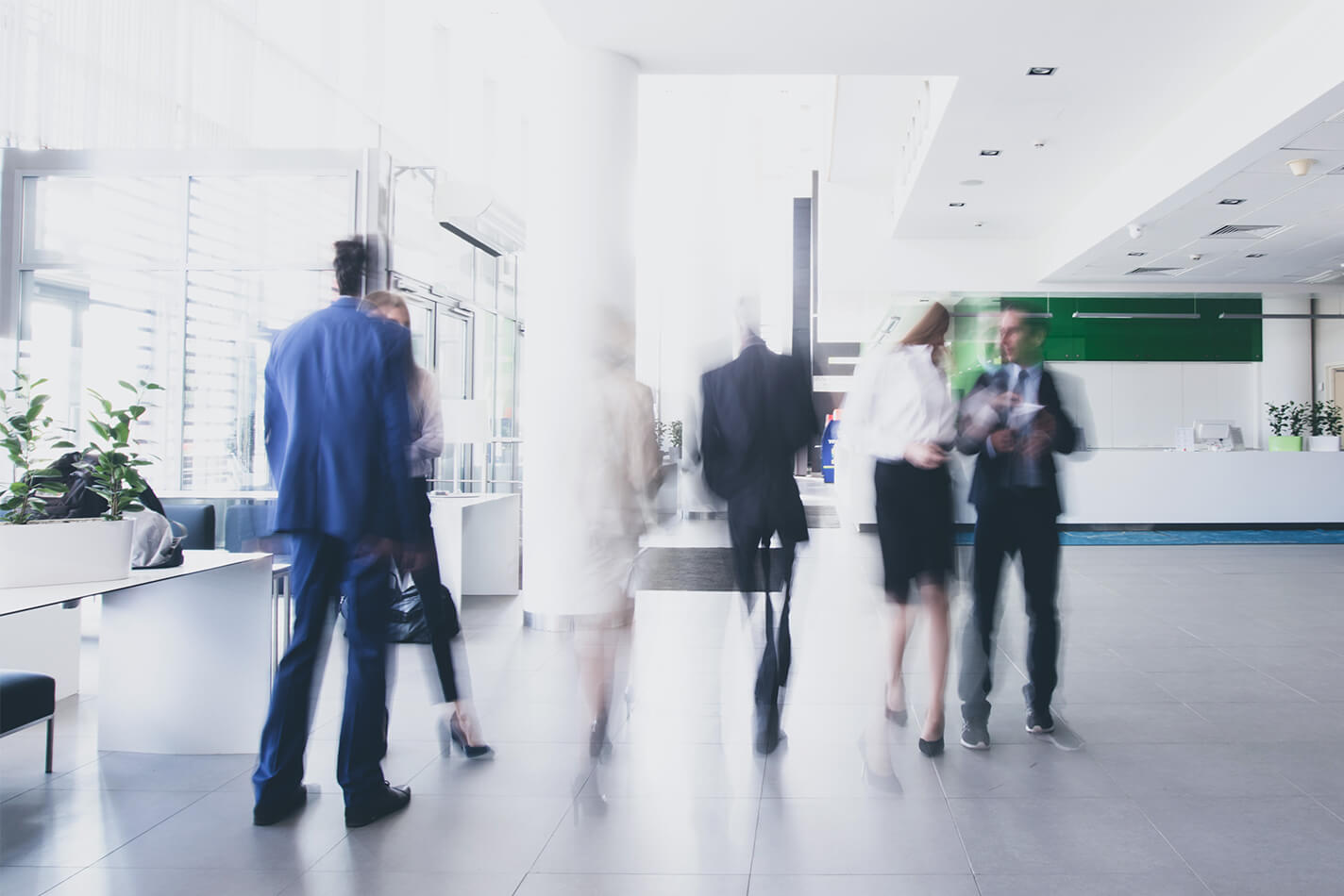 Visitors walking inside building