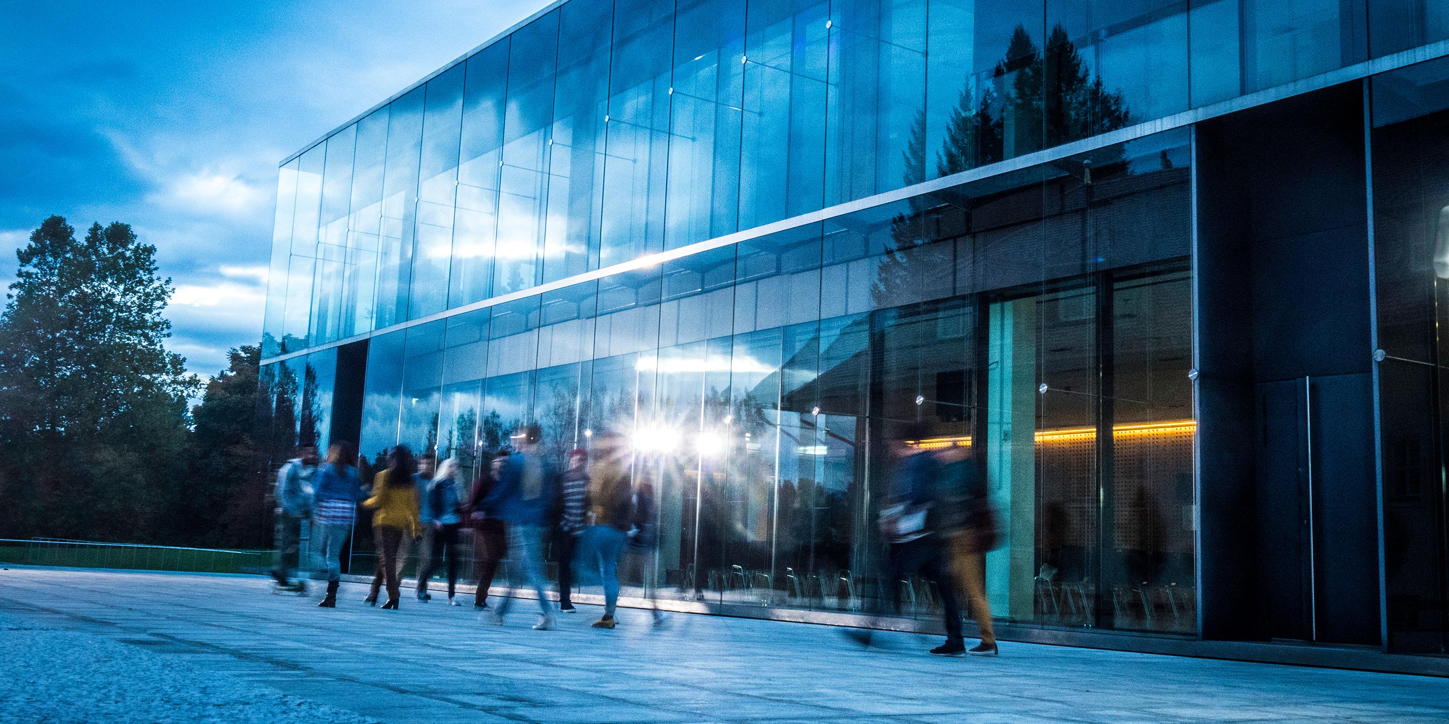 People walking outside of building
