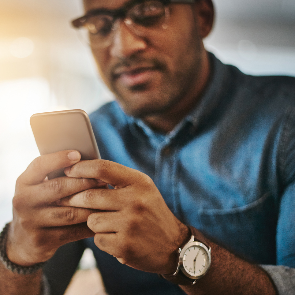 Man using handheld device