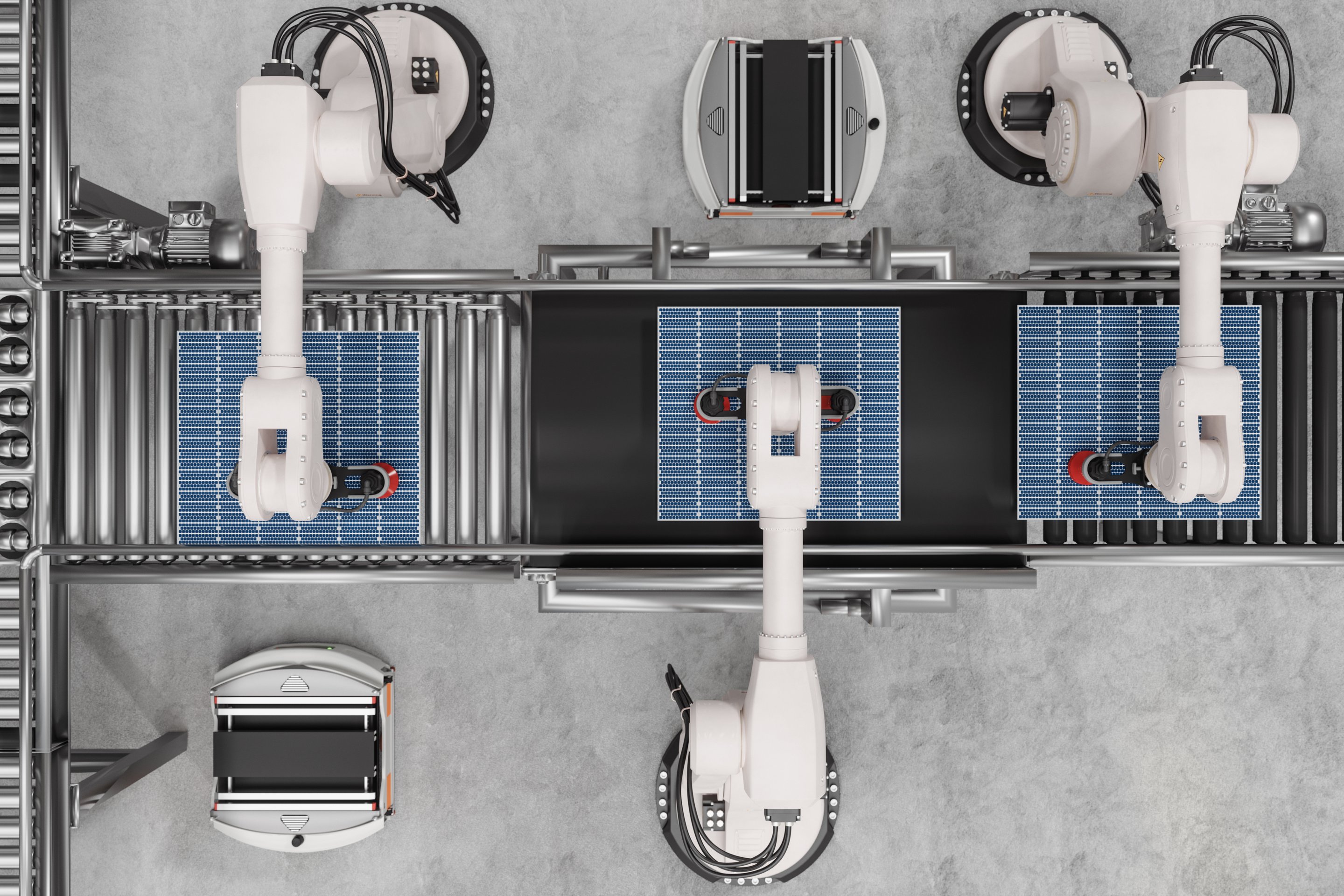 Industrial robotic arms assemble solar panels on an automated conveyor line.