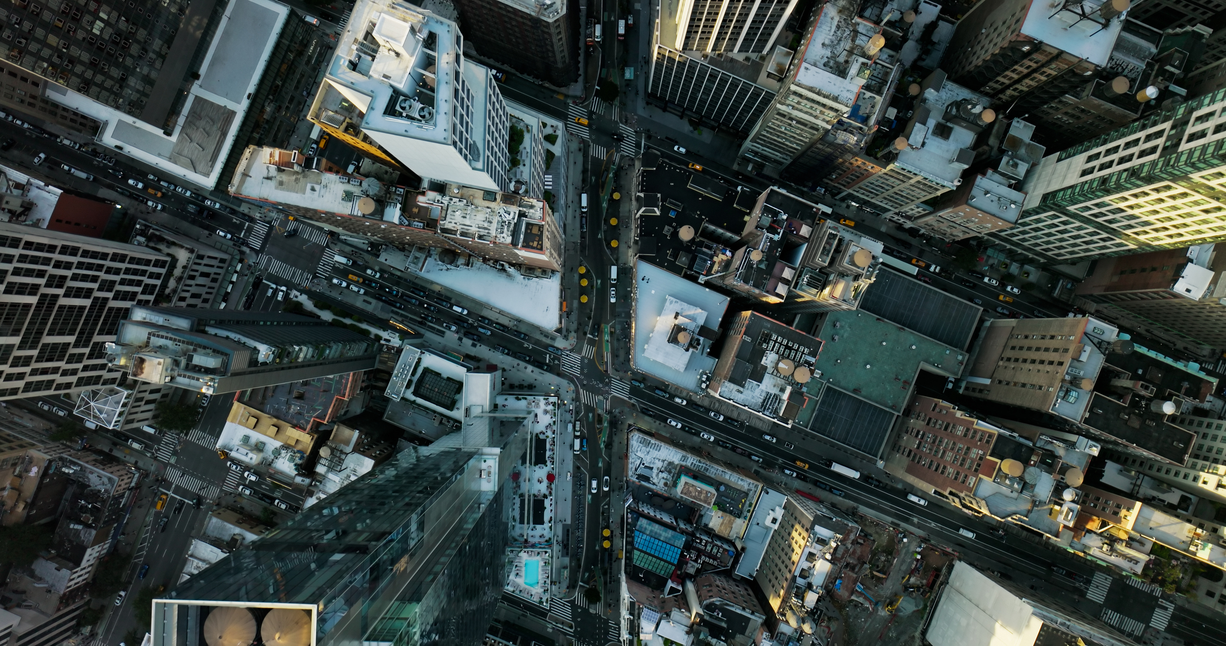An aerial shot of the busy streets in Midtown Manhattan on a sunny day in New York City.Authorization was obtained from the FAA for this operation in restricted airspace.