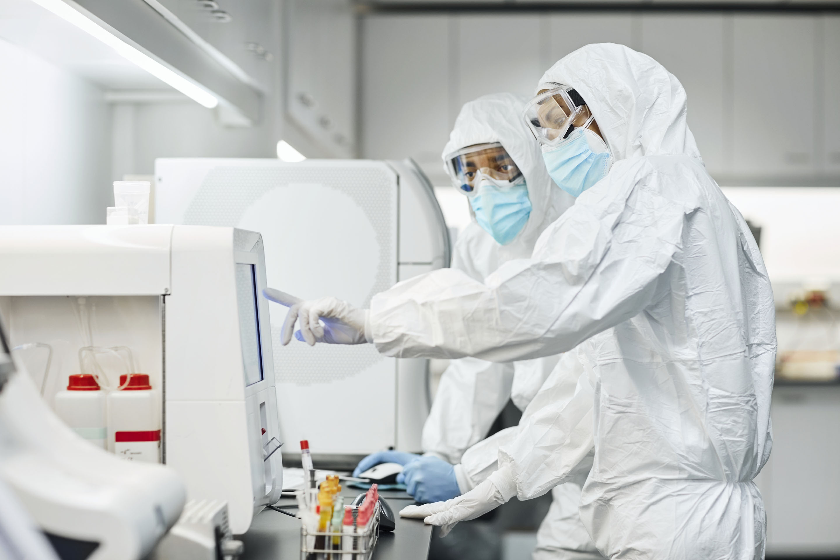 hon-biosafety-lab-workers-protective-suits-analyzer-1296010669.jpg