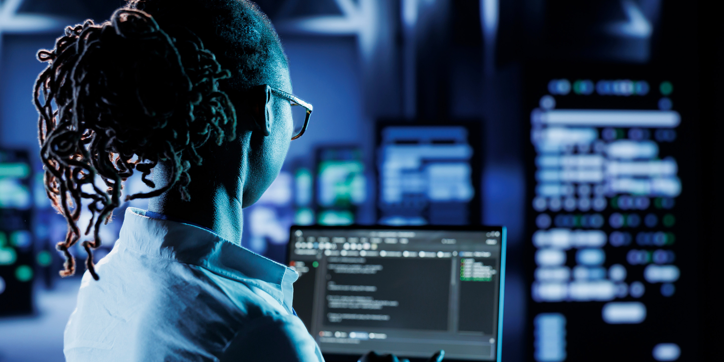 Engineer Monitoring Control Systems in a Control Room