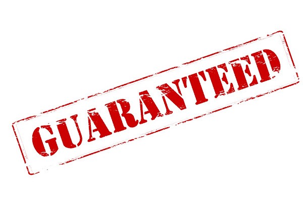 A bold red stamp graphic featuring the word “GUARANTEED” in capital letters. The design has a slightly tilted orientation and a distressed, worn-out texture for a vintage effect.
