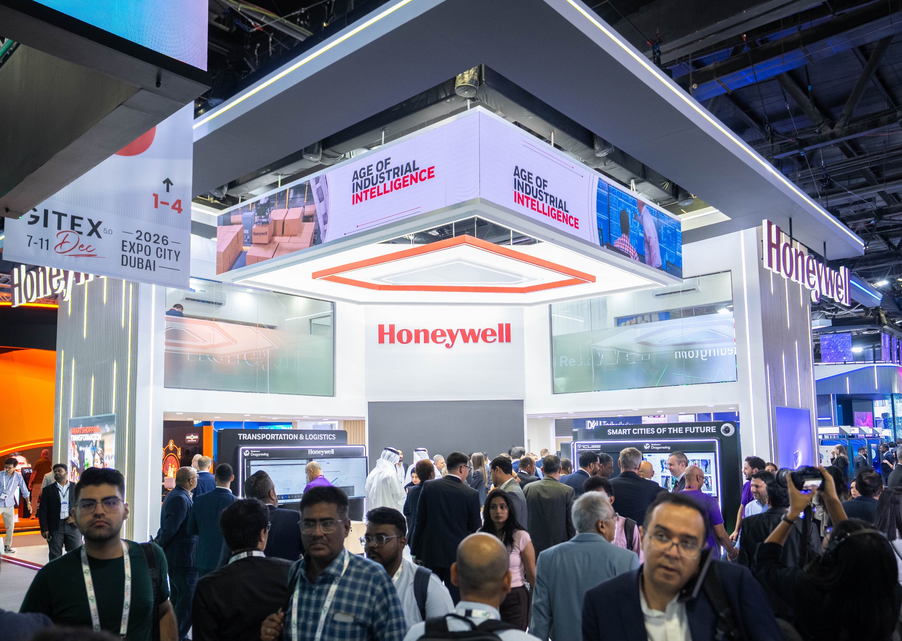 A bustling Honeywell exhibition booth at GITEX in Expo City Dubai showcases cutting-edge industrial intelligence solutions.