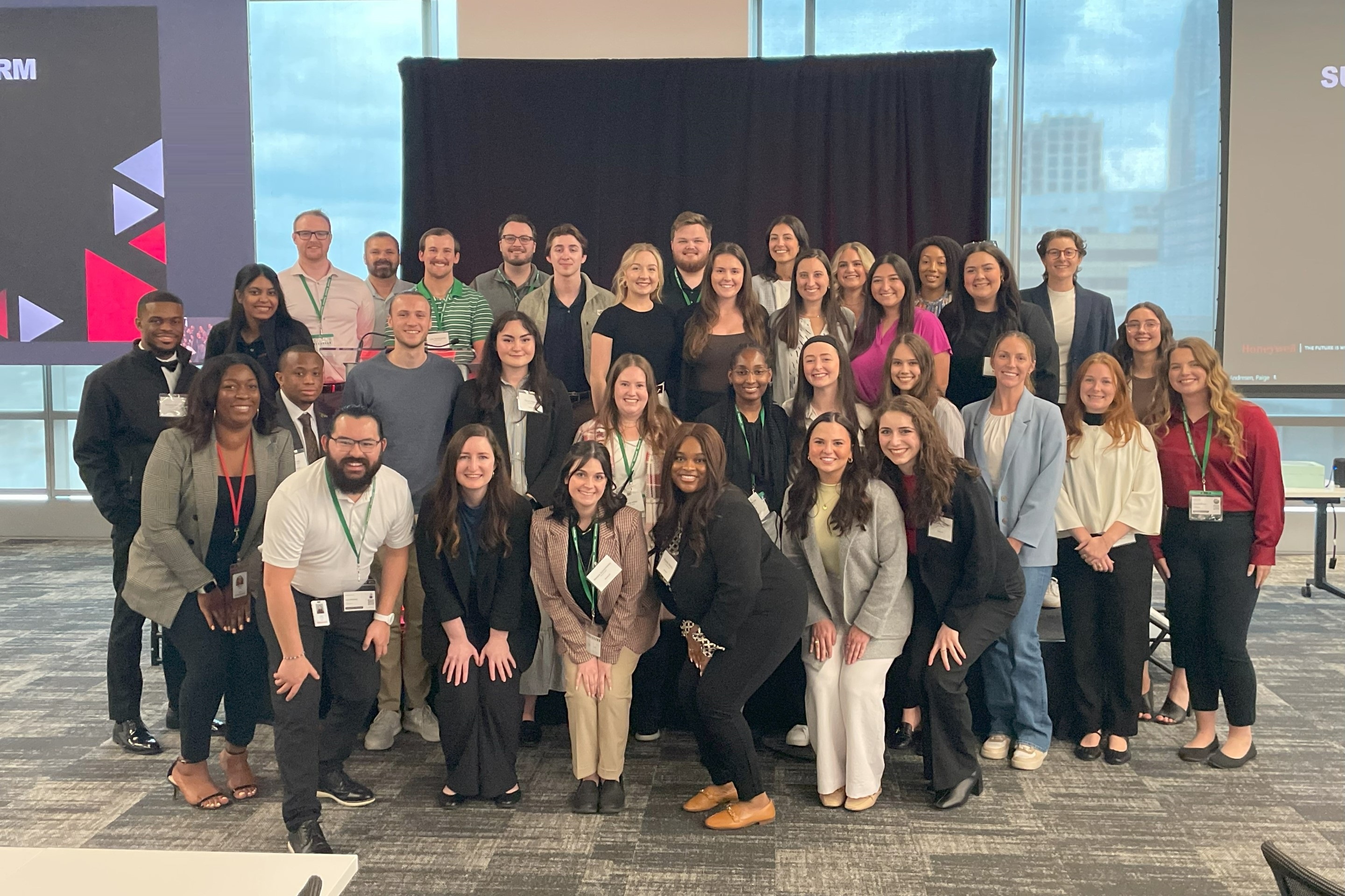A professional team captured during a 2025 corporate event, reflecting collaboration, networking, and a shared commitment to inclusion and engagement goals.
